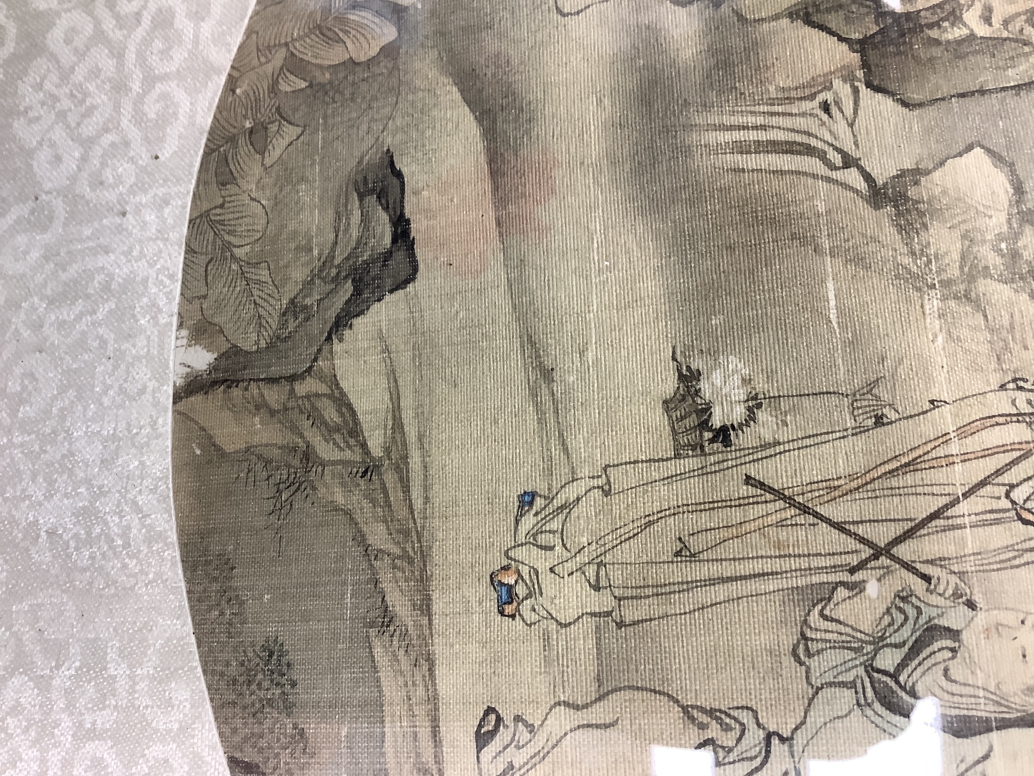 A 19th century Chinese painted silk circular rigid fan leaf, inscribed, 24.5cm diameter